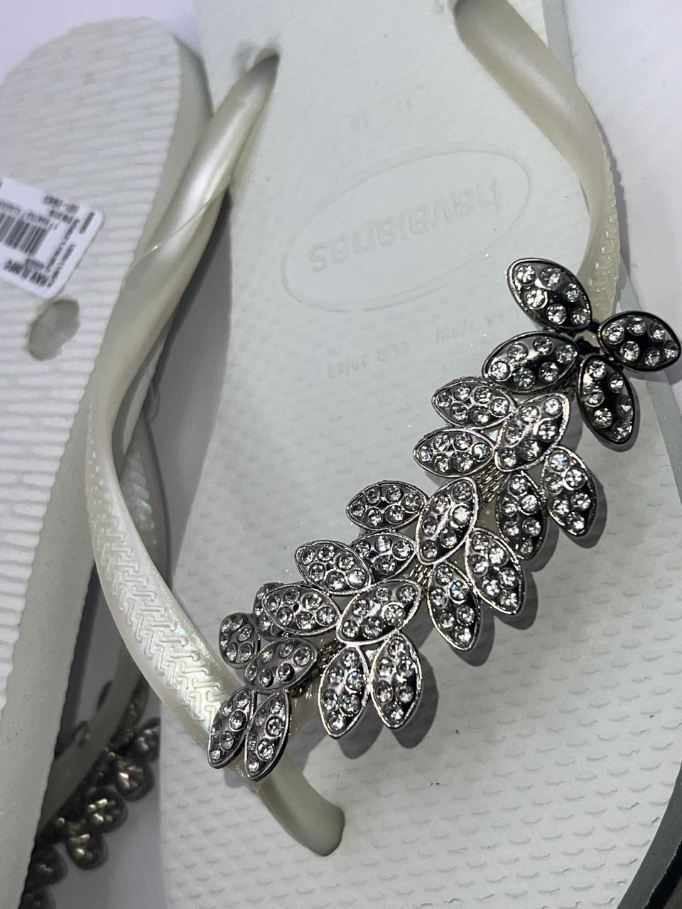 White charm flip flop size 5