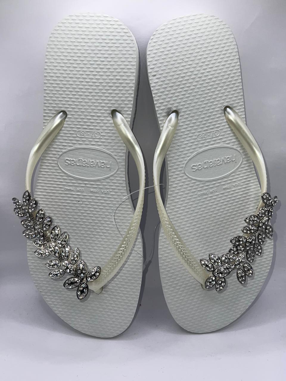 White charm flip flop size 5